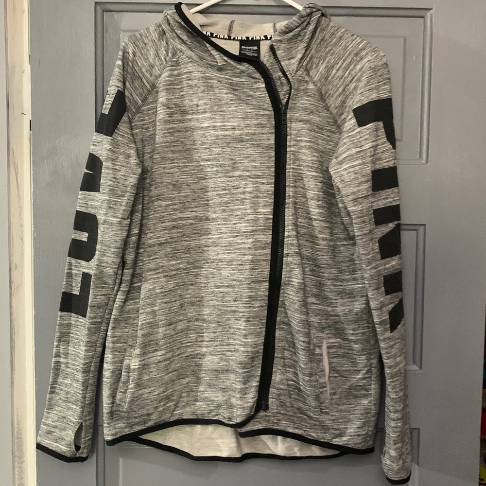 A zip up jacket from the brand PINK.